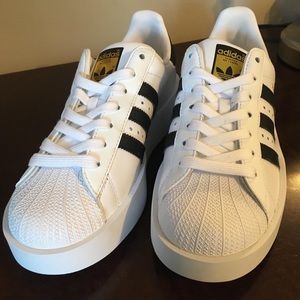 Sold Bran new adidas with plataform